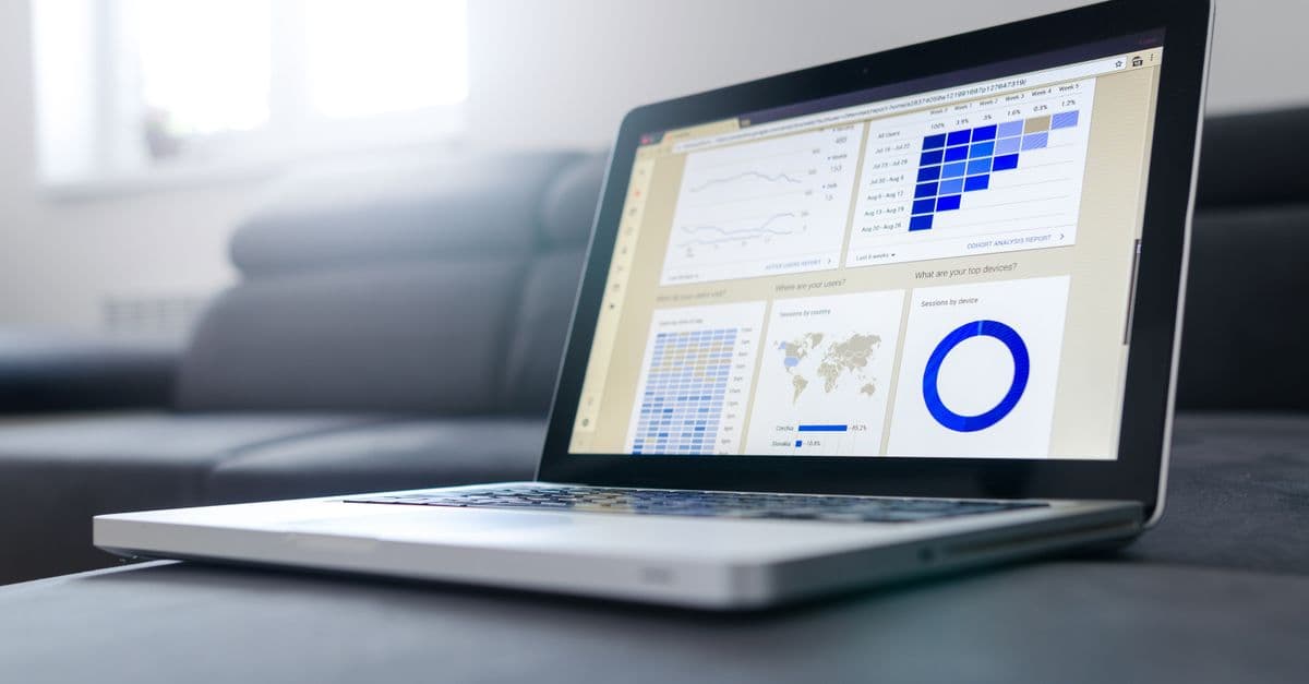A laptop showing learning analytics charts