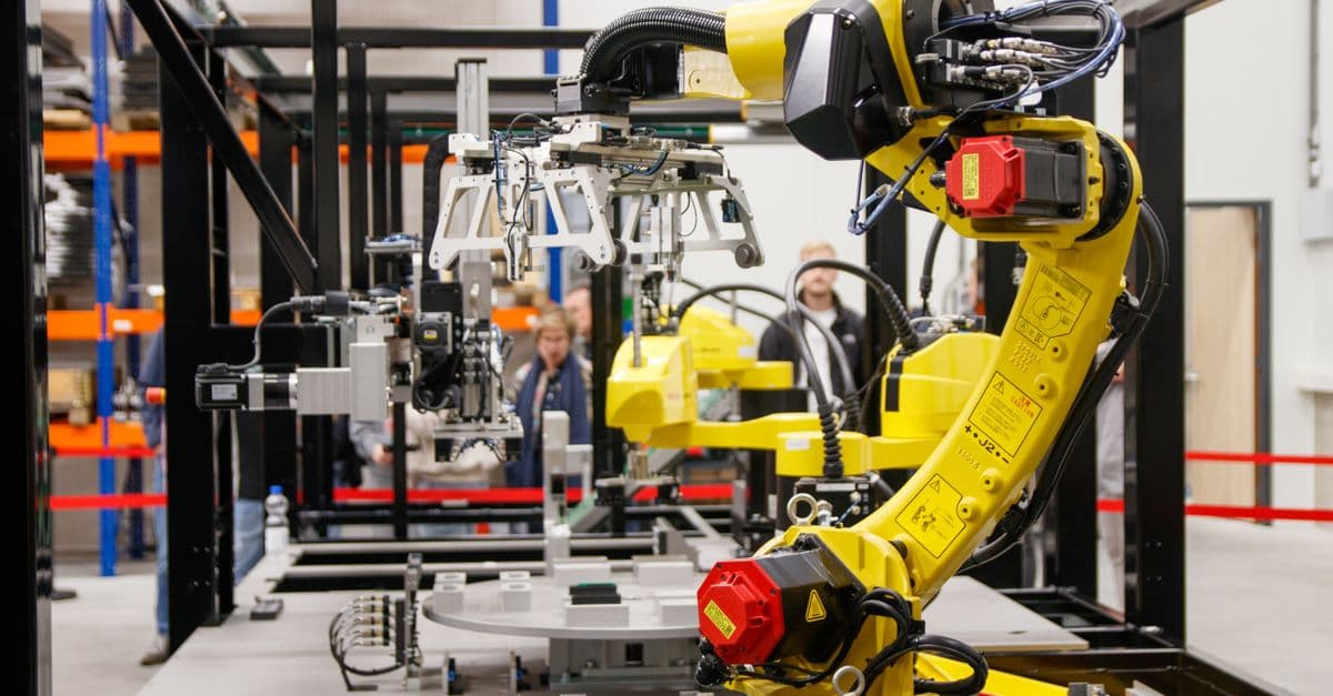 A robotic arm on a modern assembly line